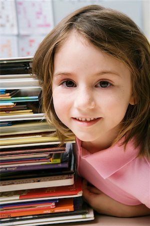 school elementary outside - Little Girl with a Stack of Books Stock Photo - Premium Royalty-Free, Code: 693-06020655