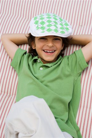 Boy Wearing Newsboy Cap Stock Photo - Premium Royalty-Free, Code: 693-06020675