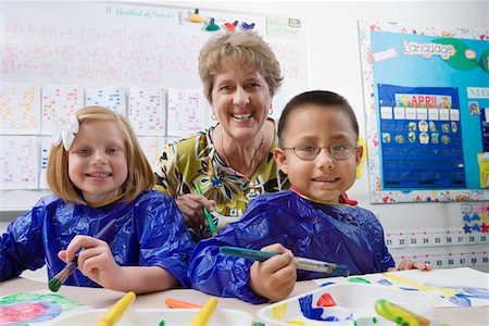 Teacher and Elementary Students Foto de stock - Sin royalties Premium, Código: 693-06020689