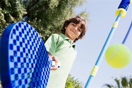 paddling - Boy Playing with Paddle and Tethered Ball Stock Photo - Premium Royalty-Free, Code: 693-06020691