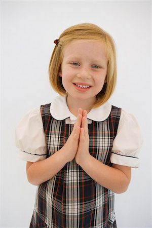 folded hands - Girl Wearing School Uniform Foto de stock - Sin royalties Premium, Código: 693-06020865