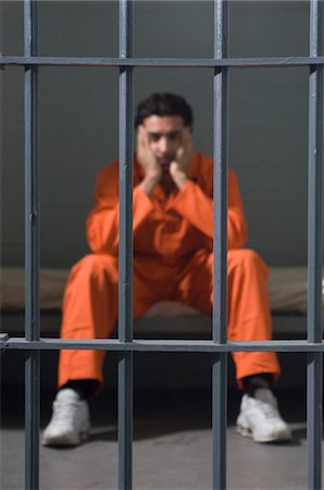 prisoner - Prisoner in cell Stock Photo - Premium Royalty-Free, Code: 693-06020898