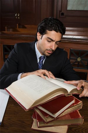 defense lawyer - Man reading in court Stock Photo - Premium Royalty-Free, Code: 693-06020974
