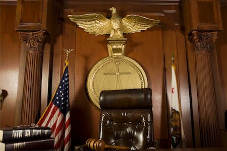 Judges chair in court room Stock Photo - Premium Royalty-Free, Code: 693-06021001