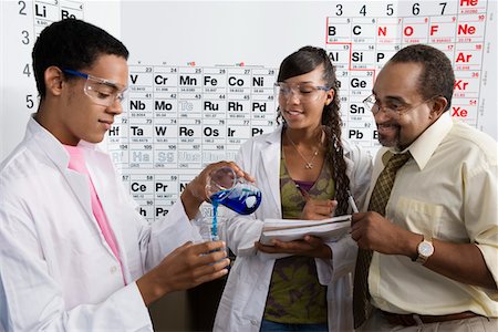 Teacher and Students in Science Class Foto de stock - Sin royalties Premium, Código: 693-06021080