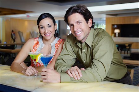 Couple Drinking Martinis Stock Photo - Premium Royalty-Free, Code: 693-06021218