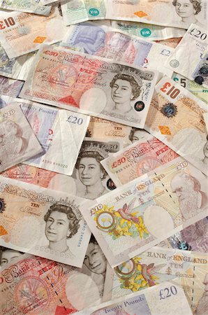 piles of cash pounds - Papier-monnaie britanniques Photographie de stock - Premium Libres de Droits, Code: 693-06021276