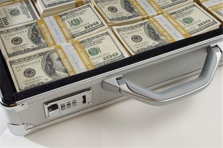 revenue - Briefcase Full of Money Stock Photo - Premium Royalty-Free, Code: 693-06021288