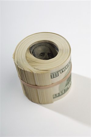 simsearch:693-06021301,k - Rolled Up Money Stock Photo - Premium Royalty-Free, Code: 693-06021297