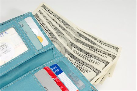 délabré - Wallet Full of Money Foto de stock - Sin royalties Premium, Código: 693-06021326