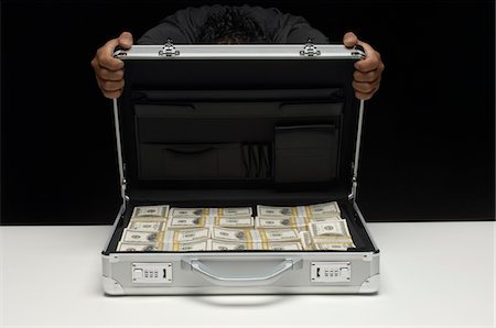 Briefcase Full of Money Foto de stock - Sin royalties Premium, Código: 693-06021347