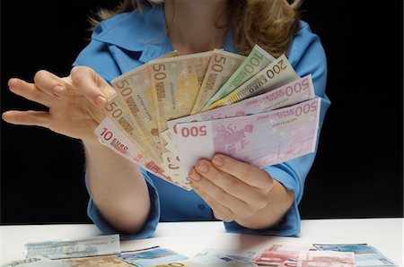 Woman Counting Money Foto de stock - Sin royalties Premium, Código: 693-06021352