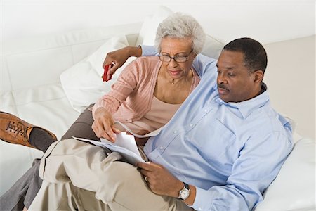 reading glasses top view - Senior Couple With Paperwork Stock Photo - Premium Royalty-Free, Code: 693-06021710