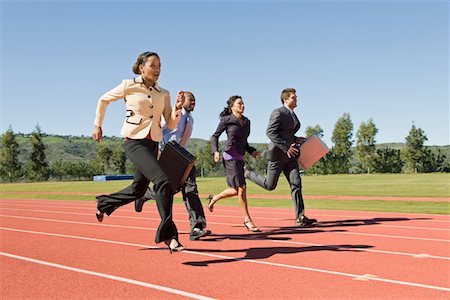 suit profile for men - Business People Racing on Track Stock Photo - Premium Royalty-Free, Code: 693-06021722