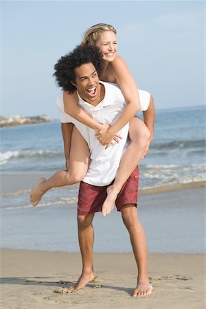 Young couple at the beach Stock Photo - Premium Royalty-Free, Code: 693-06021757