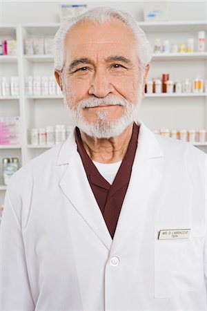 pharmacy shelf - Male pharmactist, portrait Stock Photo - Premium Royalty-Free, Code: 693-06021999