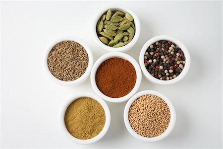 Whole cardamoms, peppercorns, mustard seeds, cumin, whole cumin and chilli Stock Photo - Premium Royalty-Free, Code: 693-06022129