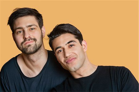 simsearch:693-06324148,k - Portrait of young male friends over colored background Stock Photo - Premium Royalty-Free, Code: 693-06324133