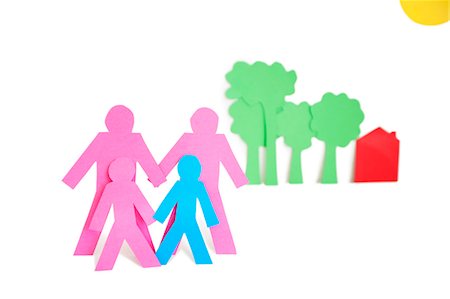 stick figures - Paper cut outs representing a family with trees and house over white background Stock Photo - Premium Royalty-Free, Code: 693-06324326