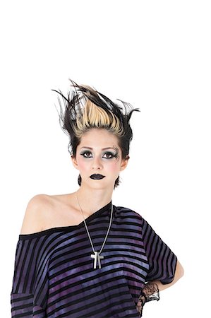 funky - Portrait of a gothic woman with spiked hair over white background Stock Photo - Premium Royalty-Free, Code: 693-06324410