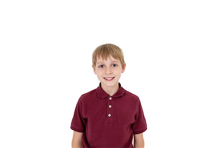 preteen boy happy white background - Cutout portrait of pre-teen boy over white background Stock Photo - Premium Royalty-Free, Code: 693-06324796