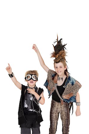 punk fashion photography - Portrait of friends in outfit with hands raised over white background Stock Photo - Premium Royalty-Free, Code: 693-06324805