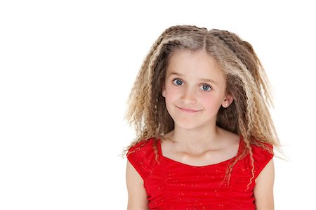 studio kid fashion - Portrait of happy school girl over white background Stock Photo - Premium Royalty-Free, Code: 693-06324822
