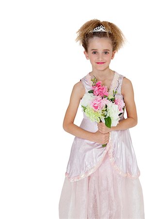 simsearch:693-06324793,k - Portrait of bridesmaid standing with bouquet over white background Fotografie stock - Premium Royalty-Free, Codice: 693-06324850