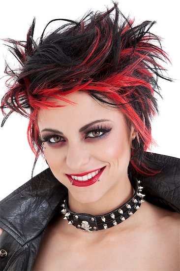 Portrait of beautiful young punk woman with spiked hair Foto de stock - Sin royalties Premium, Código de la imagen: 693-06325020