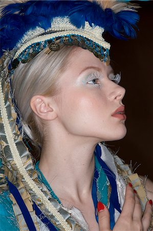 profile woman head and shoulders one person studio shot side view looking away - Side view fashion model wearing headgear looking away Stock Photo - Premium Royalty-Free, Code: 693-06325039