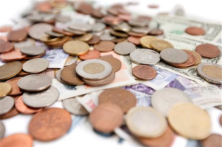 stacks of coins - Selective focus of currencies Stock Photo - Premium Royalty-Free, Code: 693-06325205