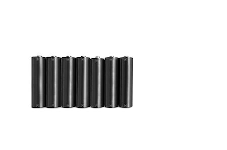 energy source - Close-up of black batteries over white background Stock Photo - Premium Royalty-Free, Code: 693-06325219