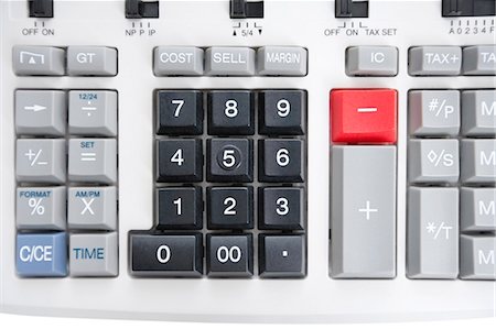 simbolo dell'addizione - Close-up of pushbuttons of calculator Fotografie stock - Premium Royalty-Free, Codice: 693-06325229