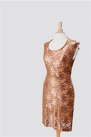 studio fabric - Dress on tailor's dummy over gray background Stock Photo - Premium Royalty-Free, Code: 693-06378981