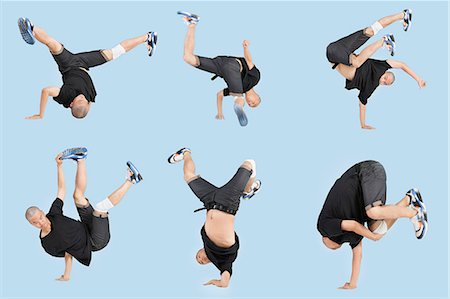 Multiple image of young man break dancing over light blue background Stock Photo - Premium Royalty-Free, Code: 693-06379491