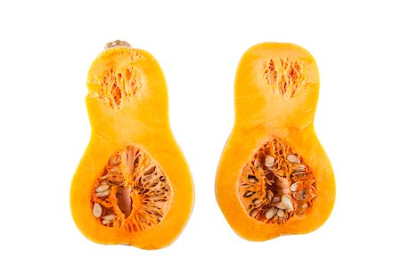 pumpkin seed - Halved butternut squash over white background Stock Photo - Premium Royalty-Free, Code: 693-06497623