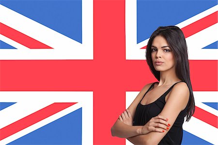 drapeau britannique - Portrait of young woman against British flag Photographie de stock - Premium Libres de Droits, Code: 693-06497756