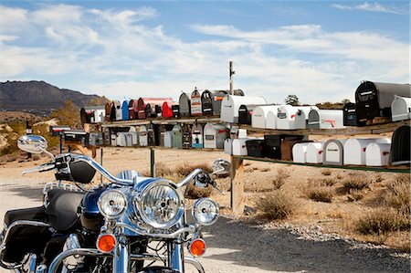 desert road nobody - Motorcycle in front of rural mailboxes Stock Photo - Premium Royalty-Free, Code: 693-06667805