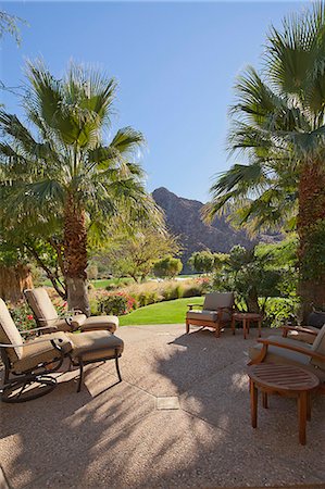 front yard landscape - Patio with relaxing chairs and gardens Stock Photo - Premium Royalty-Free, Code: 693-06667927