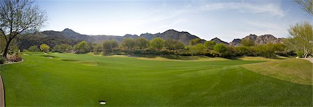 panoramique - Panoramic view of a golf course Photographie de stock - Premium Libres de Droits, Code: 693-06667941