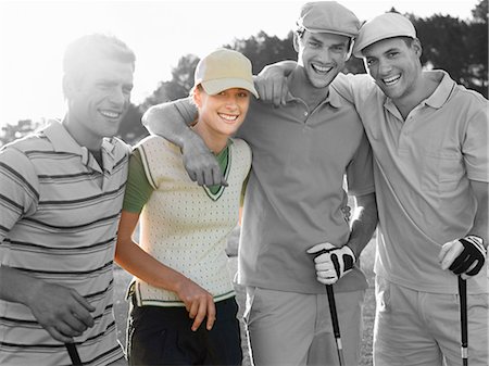 simsearch:693-06668077,k - Portrait of four young friends at golf course Fotografie stock - Premium Royalty-Free, Codice: 693-06668077