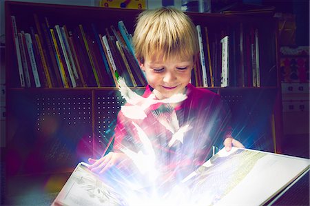 digital manipulation photography - Little boy reading a book Stock Photo - Premium Royalty-Free, Code: 693-07444555