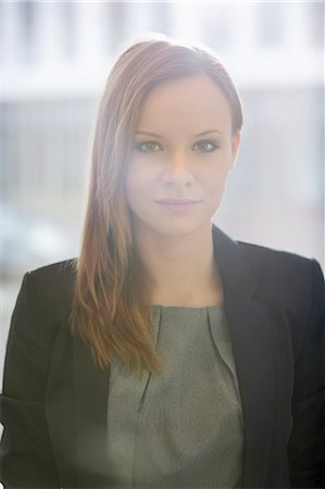 shoulder length hair - Portrait of confident businesswoman in office Stock Photo - Premium Royalty-Free, Code: 693-07542180