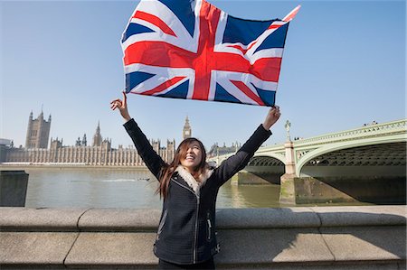 simsearch:693-07542370,k - Happy woman holding British flag while standing against Big Ben at London, England, UK Stockbilder - Premium RF Lizenzfrei, Bildnummer: 693-07672571