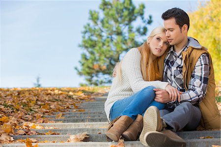 simsearch:693-07672886,k - Loving couple sitting on park steps Stock Photo - Premium Royalty-Free, Code: 693-07672896