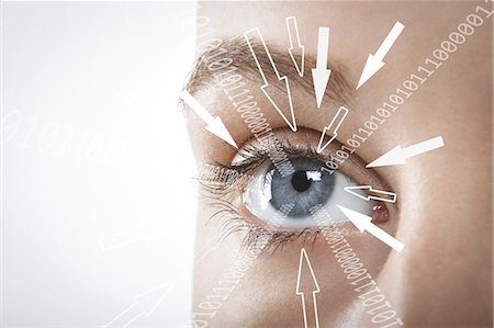 private eye - Cropped image of businesswoman with binary digits and arrow signs moving towards her eye against white background Stock Photo - Premium Royalty-Free, Code: 693-07673291