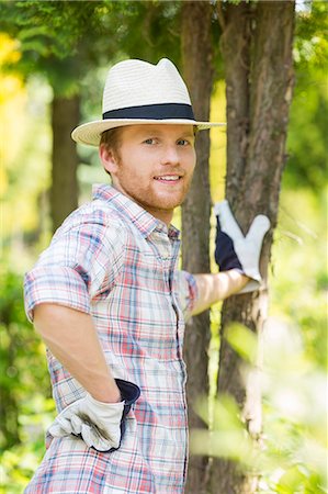 simsearch:693-07912856,k - Portrait of confident gardener standing at plant nursery Stock Photo - Premium Royalty-Free, Code: 693-07912896