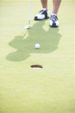 simsearch:649-08422474,k - Low section of man playing golf Stock Photo - Premium Royalty-Free, Code: 693-08127210