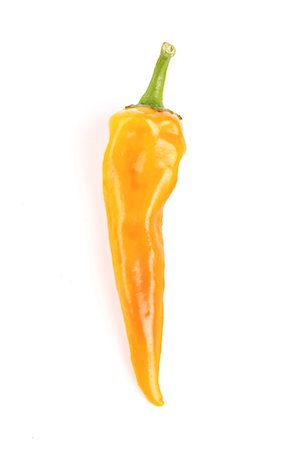 simsearch:693-08127309,k - Close-up of chilli pepper on white background Foto de stock - Sin royalties Premium, Código: 693-08127338