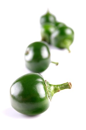 Close-up of green chilli pepper Photographie de stock - Premium Libres de Droits, Code: 693-08127341